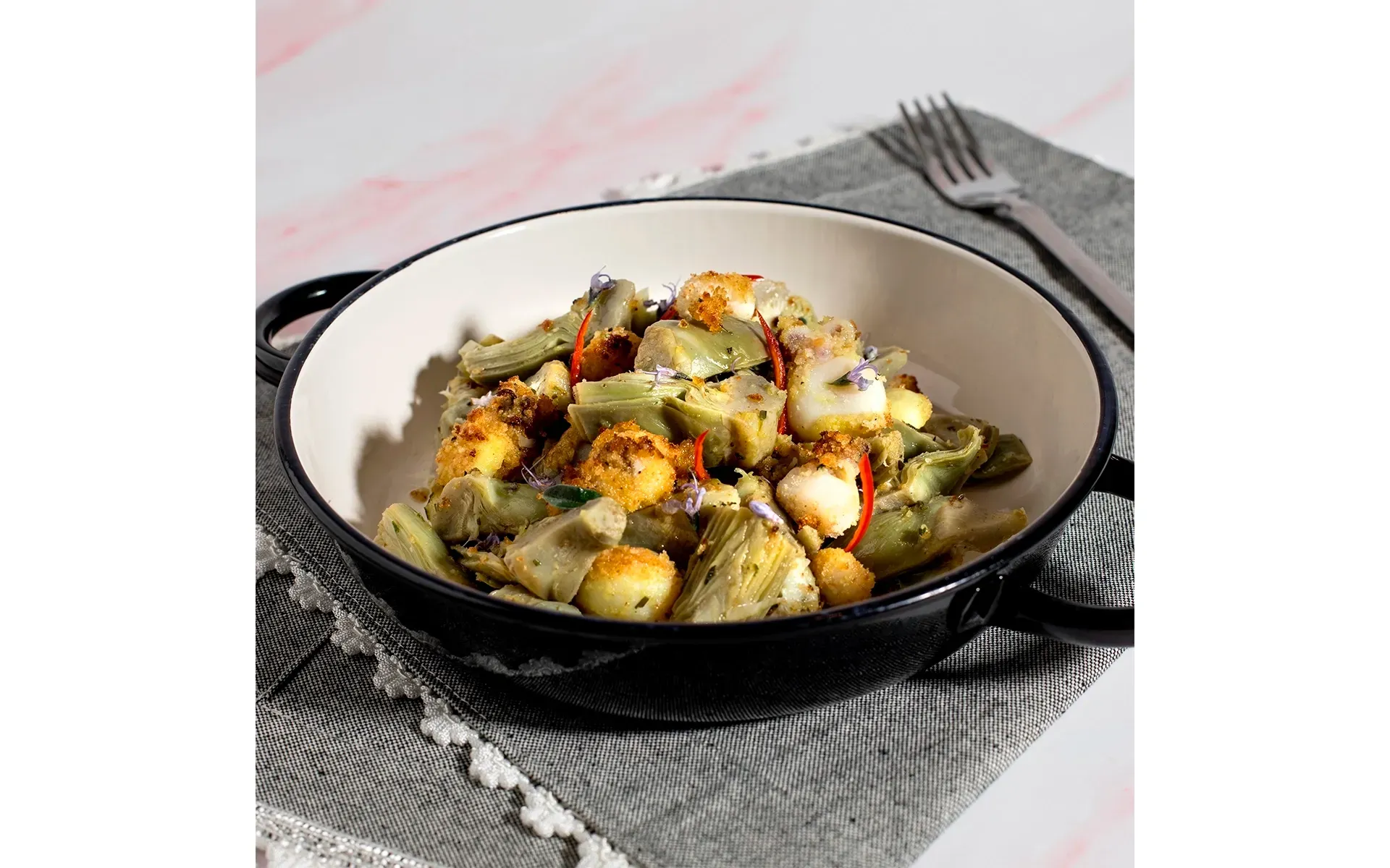 Seppioline gratinate Orogel con carciofi e peperoncino: un secondo di mare sfizioso.