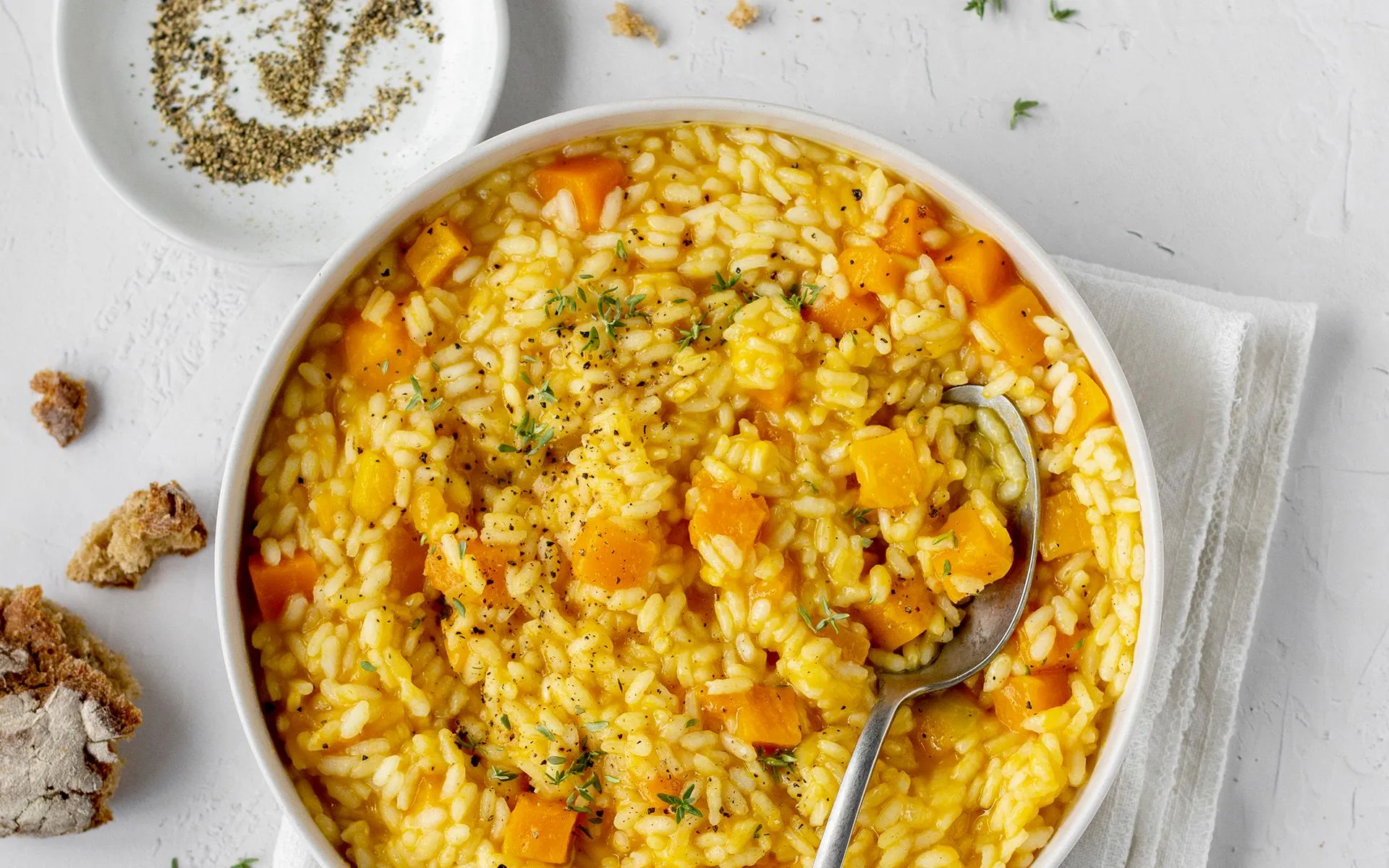 Risotto Orogel alla zucca, un classico autunnale, cremoso e dolce, con burro.